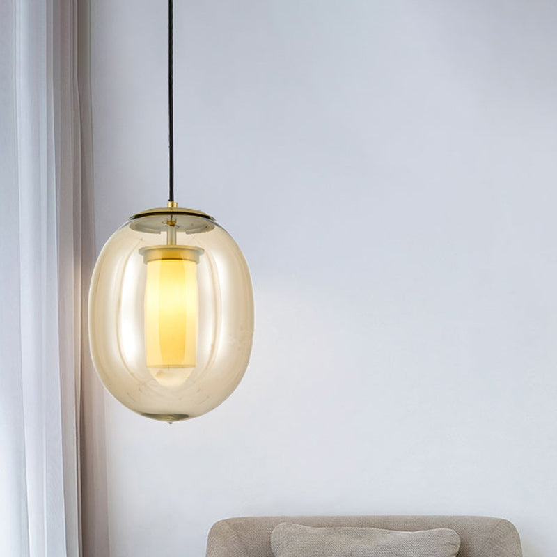 Amber Glass Oval Pendant Ceiling Light Contemporary 1 Head 7"/8.5" Gold Hanging Lamp Kit Clearhalo 'Ceiling Lights' 'Glass shade' 'Glass' 'Modern Pendants' 'Modern' 'Pendant Lights' 'Pendants' Lighting' 289275