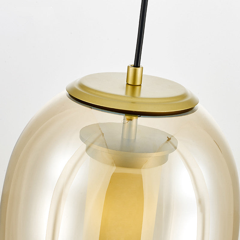 Amber Glass Oval Pendant Ceiling Light Contemporary 1 Head 7"/8.5" Gold Hanging Lamp Kit Clearhalo 'Ceiling Lights' 'Glass shade' 'Glass' 'Modern Pendants' 'Modern' 'Pendant Lights' 'Pendants' Lighting' 289281