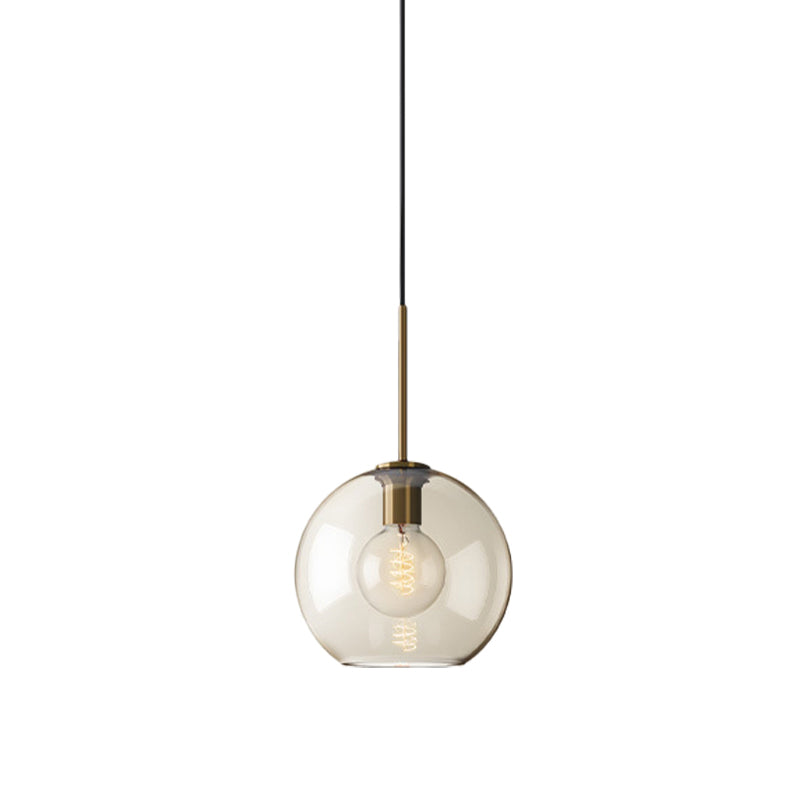 Amber Glass Sphere Pendant Lighting Modern 1 Head 8"/10"/12" Wide Brass Hanging Ceiling Light Clearhalo 'Ceiling Lights' 'Modern Pendants' 'Modern' 'Pendant Lights' 'Pendants' Lighting' 290033_4d43bd70-0b0e-40c9-8b40-9f645467f58a