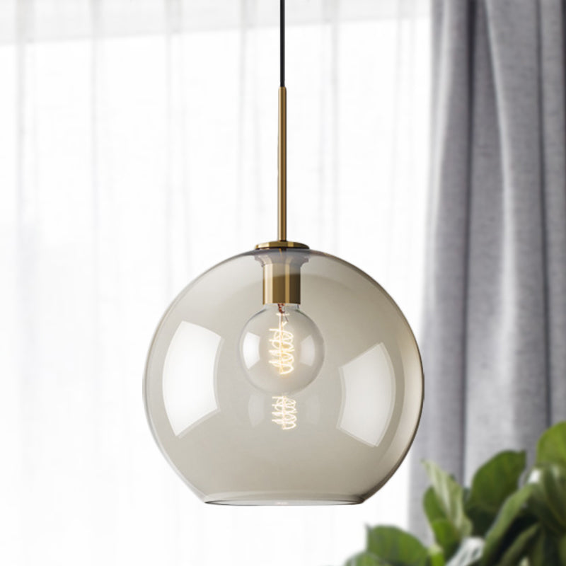 Amber Glass Sphere Pendant Lighting Modern 1 Head 8"/10"/12" Wide Brass Hanging Ceiling Light Brass 12" Clearhalo 'Ceiling Lights' 'Modern Pendants' 'Modern' 'Pendant Lights' 'Pendants' Lighting' 290041