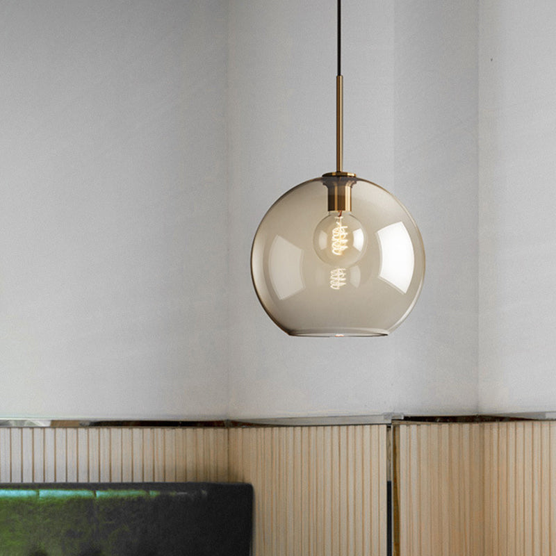 Amber Glass Sphere Pendant Lighting Modern 1 Head 8"/10"/12" Wide Brass Hanging Ceiling Light Clearhalo 'Ceiling Lights' 'Modern Pendants' 'Modern' 'Pendant Lights' 'Pendants' Lighting' 290043