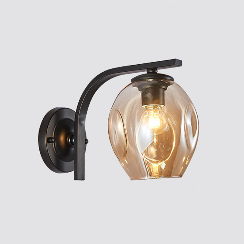 Cup Sconce Modern Blue/Green/Amber Dimpled Blown Glass 1 Head Wall Mounted Lighting with Black/Gold Metal Curved Arm for Bedside Clearhalo 'Cast Iron' 'Glass' 'Industrial' 'Modern wall lights' 'Modern' 'Tiffany' 'Traditional wall lights' 'Wall Lamps & Sconces' 'Wall Lights' Lighting' 294516