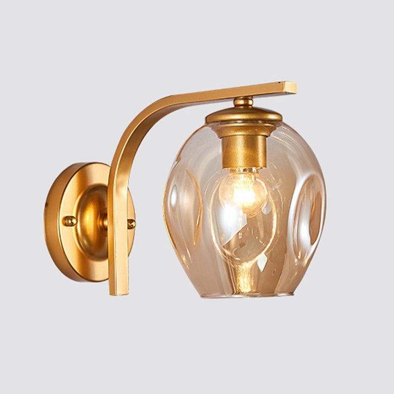 Cup Sconce Modern Blue/Green/Amber Dimpled Blown Glass 1 Head Wall Mounted Lighting with Black/Gold Metal Curved Arm for Bedside Clearhalo 'Cast Iron' 'Glass' 'Industrial' 'Modern wall lights' 'Modern' 'Tiffany' 'Traditional wall lights' 'Wall Lamps & Sconces' 'Wall Lights' Lighting' 294524