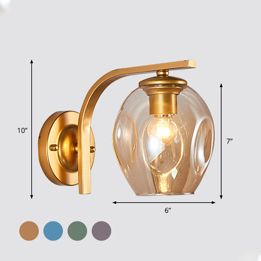 Cup Sconce Modern Blue/Green/Amber Dimpled Blown Glass 1 Head Wall Mounted Lighting with Black/Gold Metal Curved Arm for Bedside Clearhalo 'Cast Iron' 'Glass' 'Industrial' 'Modern wall lights' 'Modern' 'Tiffany' 'Traditional wall lights' 'Wall Lamps & Sconces' 'Wall Lights' Lighting' 294525