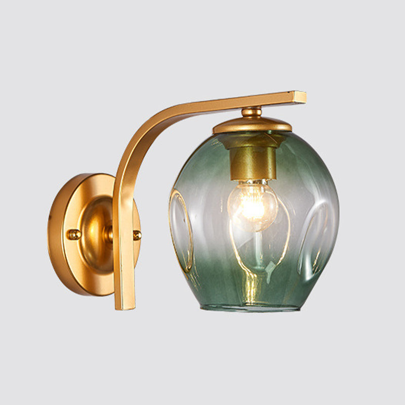 Cup Sconce Modern Blue/Green/Amber Dimpled Blown Glass 1 Head Wall Mounted Lighting with Black/Gold Metal Curved Arm for Bedside Gold Green Clearhalo 'Cast Iron' 'Glass' 'Industrial' 'Modern wall lights' 'Modern' 'Tiffany' 'Traditional wall lights' 'Wall Lamps & Sconces' 'Wall Lights' Lighting' 294528