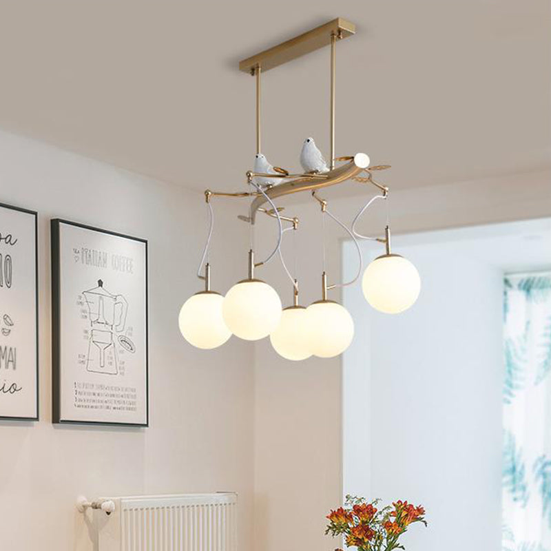 Milky Blown Glass Sphere Chandelier Pendant Postmodern 5 Heads Gold Finish Hanging Light Kit with Bird Deco Clearhalo 'Ceiling Lights' 'Chandeliers' 'Modern Chandeliers' 'Modern' Lighting' 295474