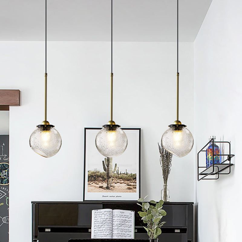 Modern 1 Bulb Hanging Light Gold Sphere Ceiling Suspension Lamp with Water Glass Shade Gold Clearhalo 'Ceiling Lights' 'Glass shade' 'Glass' 'Modern Pendants' 'Modern' 'Pendant Lights' 'Pendants' Lighting' 302759