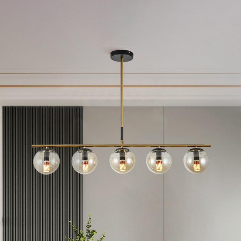 Linear Dining Room Island Lamp Cognac Glass 5 Lights Contemporary Hanging Pendant Light in Brass Clearhalo 'Ceiling Lights' 'Chandeliers' 'Glass shade' 'Glass' 'Island Lights' Lighting' 303471