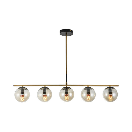 Linear Dining Room Island Lamp Cognac Glass 5 Lights Contemporary Hanging Pendant Light in Brass Clearhalo 'Ceiling Lights' 'Chandeliers' 'Glass shade' 'Glass' 'Island Lights' Lighting' 303472