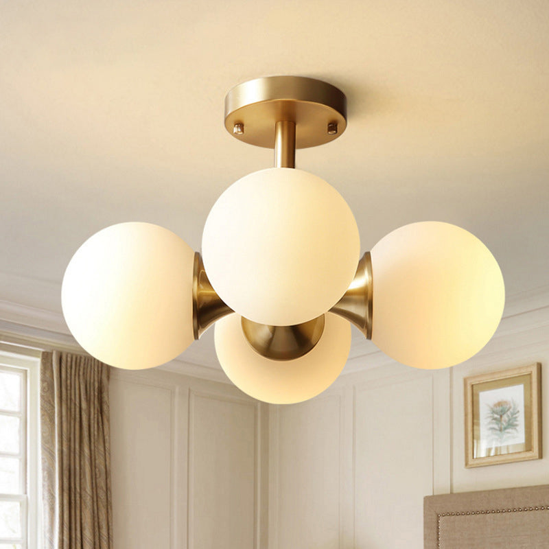 Gold Ball Semi Flush Light Contemporary 4 Heads Milky Glass Close to Ceiling Lamp Clearhalo 'Ceiling Lights' 'Chandeliers' 'Close To Ceiling Lights' 'Close to ceiling' 'Glass shade' 'Glass' 'Semi-flushmount' Lighting' 303703
