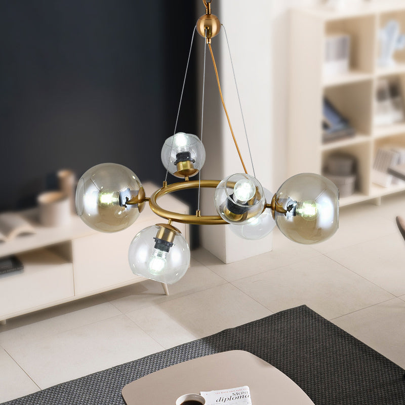 Gold Spherical Pendant Chandelier Contemporary 6/9 Heads Clear Glass Ceiling Hanging Light Clearhalo 'Ceiling Lights' 'Chandeliers' 'Close To Ceiling Lights' 'Glass shade' 'Glass' 'Modern Chandeliers' 'Modern' Lighting' 303727