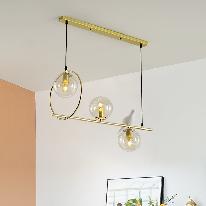 Global Island Lamp Modernist Clear Glass 3 Heads Gold Pendant Light Fixture with White Bird Gold Clearhalo 'Ceiling Lights' 'Glass shade' 'Glass' 'Island Lights' Lighting' 316471