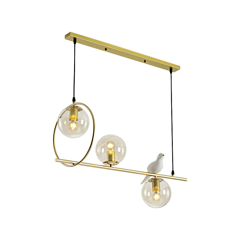 Global Island Lamp Modernist Clear Glass 3 Heads Gold Pendant Light Fixture with White Bird Clearhalo 'Ceiling Lights' 'Glass shade' 'Glass' 'Island Lights' Lighting' 316474