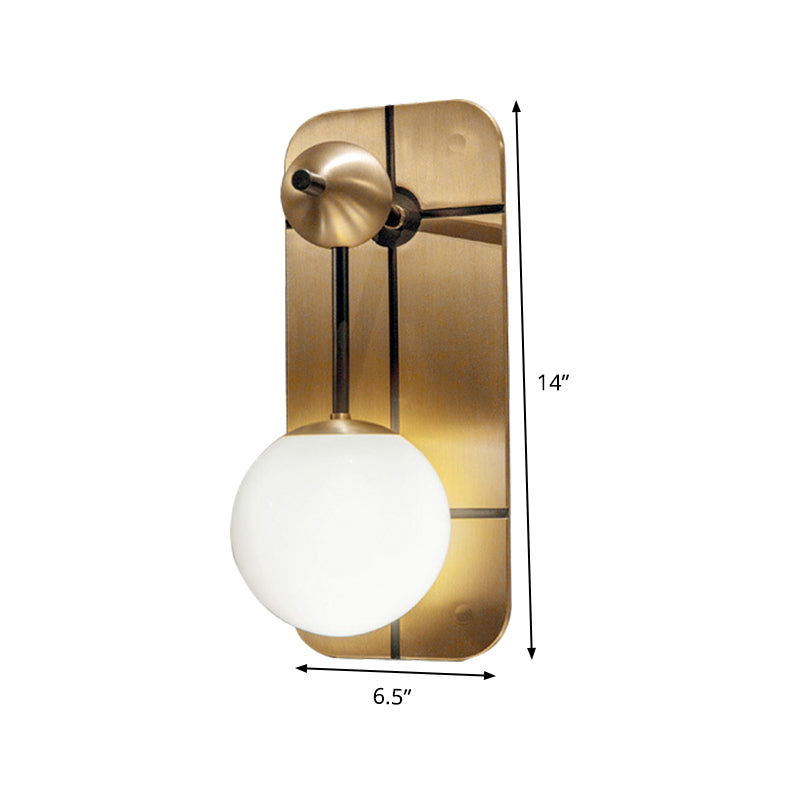 Opal Glass Ball Sconce Modernist 1 Head Brass Wall Mounted Light Fixture with Metal Rectangle Backplate Clearhalo 'Cast Iron' 'Glass' 'Industrial' 'Modern wall lights' 'Modern' 'Tiffany' 'Traditional wall lights' 'Wall Lamps & Sconces' 'Wall Lights' Lighting' 324119