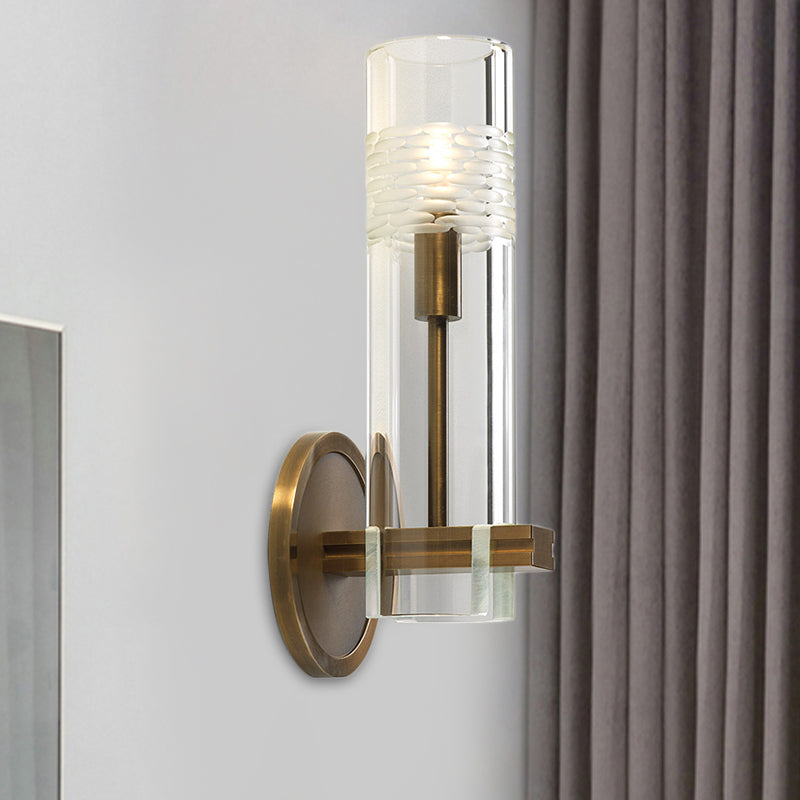 Clear Glass Tubular Sconce Light Modernism 1 Bulb Wall Lighting Fixture in Brass with Metal Arm Brass Clearhalo 'Cast Iron' 'Glass' 'Industrial' 'Modern wall lights' 'Modern' 'Tiffany' 'Traditional wall lights' 'Wall Lamps & Sconces' 'Wall Lights' Lighting' 324135