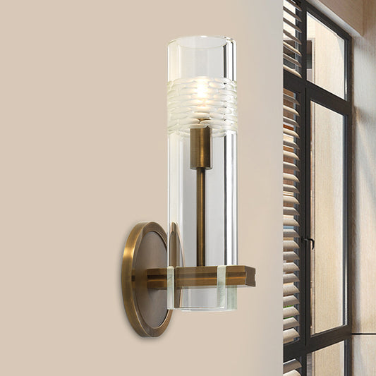 Clear Glass Tubular Sconce Light Modernism 1 Bulb Wall Lighting Fixture in Brass with Metal Arm Clearhalo 'Cast Iron' 'Glass' 'Industrial' 'Modern wall lights' 'Modern' 'Tiffany' 'Traditional wall lights' 'Wall Lamps & Sconces' 'Wall Lights' Lighting' 324136
