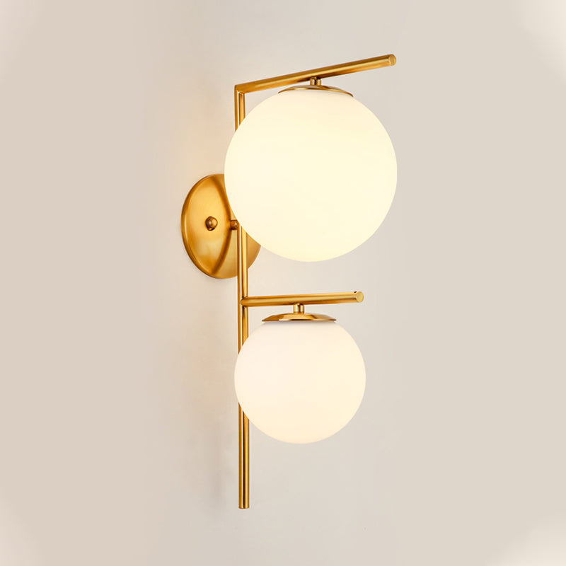 White Glass Spherical Sconce Contemporary 2 Heads Wall Mounted Light Fixture in Gold Clearhalo 'Cast Iron' 'Glass' 'Industrial' 'Modern wall lights' 'Modern' 'Tiffany' 'Traditional wall lights' 'Wall Lamps & Sconces' 'Wall Lights' Lighting' 324182