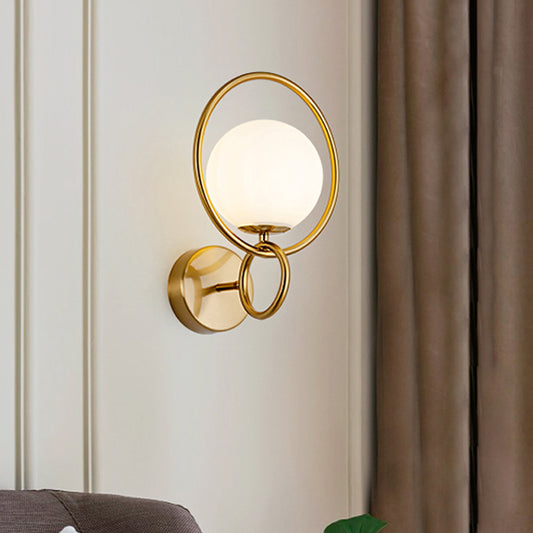 Metal Circle Sconce Light Modernist 1 Head Gold Wall Mounted Lamp with Orb White Glass Shade Gold Clearhalo 'Cast Iron' 'Glass' 'Industrial' 'Modern wall lights' 'Modern' 'Tiffany' 'Traditional wall lights' 'Wall Lamps & Sconces' 'Wall Lights' Lighting' 324250