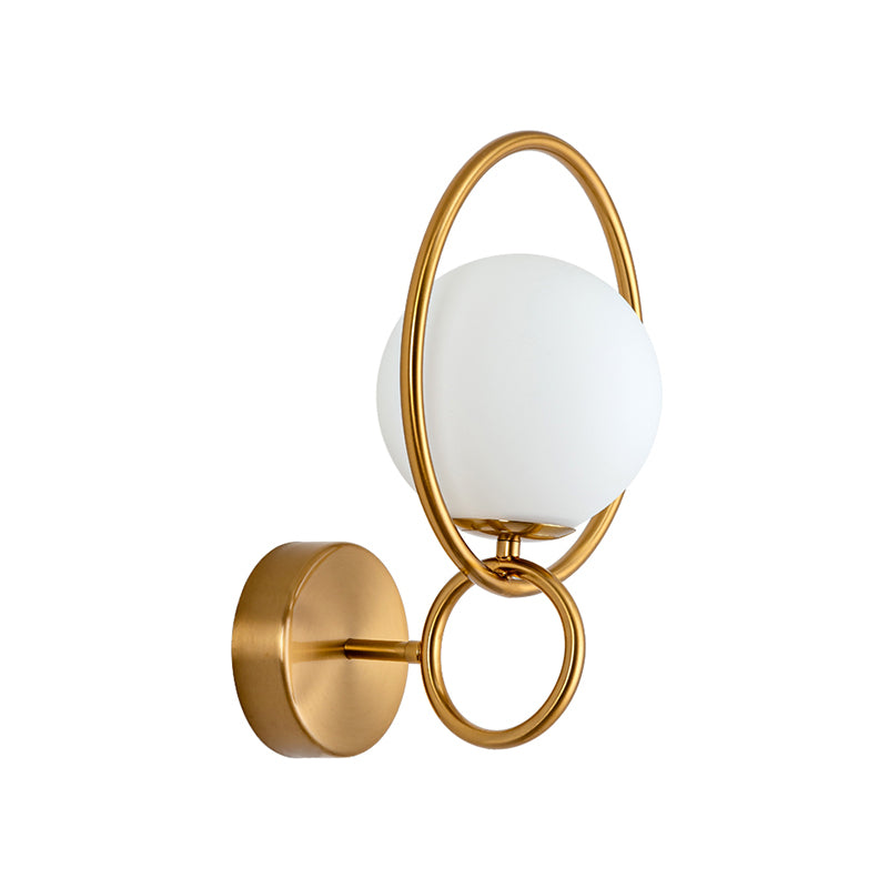 Metal Circle Sconce Light Modernist 1 Head Gold Wall Mounted Lamp with Orb White Glass Shade Clearhalo 'Cast Iron' 'Glass' 'Industrial' 'Modern wall lights' 'Modern' 'Tiffany' 'Traditional wall lights' 'Wall Lamps & Sconces' 'Wall Lights' Lighting' 324253