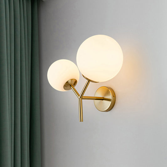 White Glass Spherical Sconce Contemporary 2 Heads Wall Mounted Light Fixture in Gold Clearhalo 'Cast Iron' 'Glass' 'Industrial' 'Modern wall lights' 'Modern' 'Tiffany' 'Traditional wall lights' 'Wall Lamps & Sconces' 'Wall Lights' Lighting' 324277