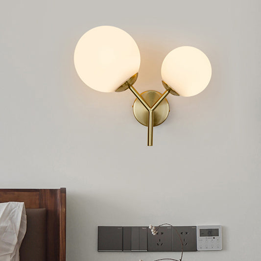 White Glass Spherical Sconce Contemporary 2 Heads Wall Mounted Light Fixture in Gold Clearhalo 'Cast Iron' 'Glass' 'Industrial' 'Modern wall lights' 'Modern' 'Tiffany' 'Traditional wall lights' 'Wall Lamps & Sconces' 'Wall Lights' Lighting' 324278