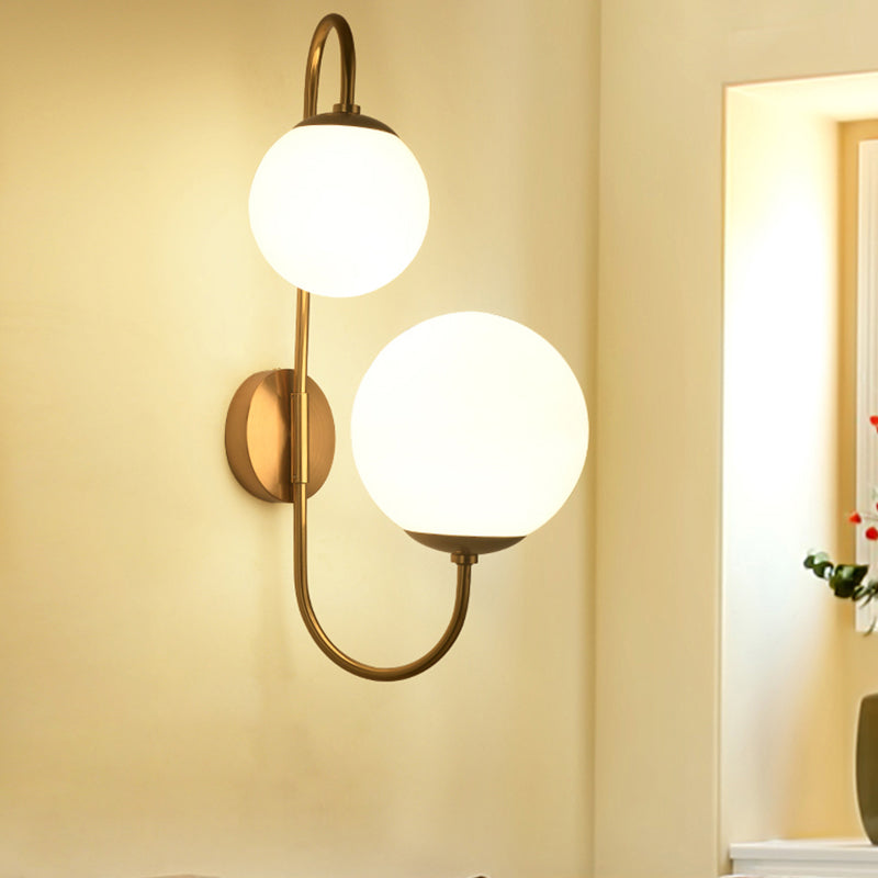 2 Bulbs Armed Sconce Contemporary Metal Wall Lighting Fixture in Gold with Ball Opal Glass Shade Clearhalo 'Cast Iron' 'Glass' 'Industrial' 'Modern wall lights' 'Modern' 'Tiffany' 'Traditional wall lights' 'Wall Lamps & Sconces' 'Wall Lights' Lighting' 324304