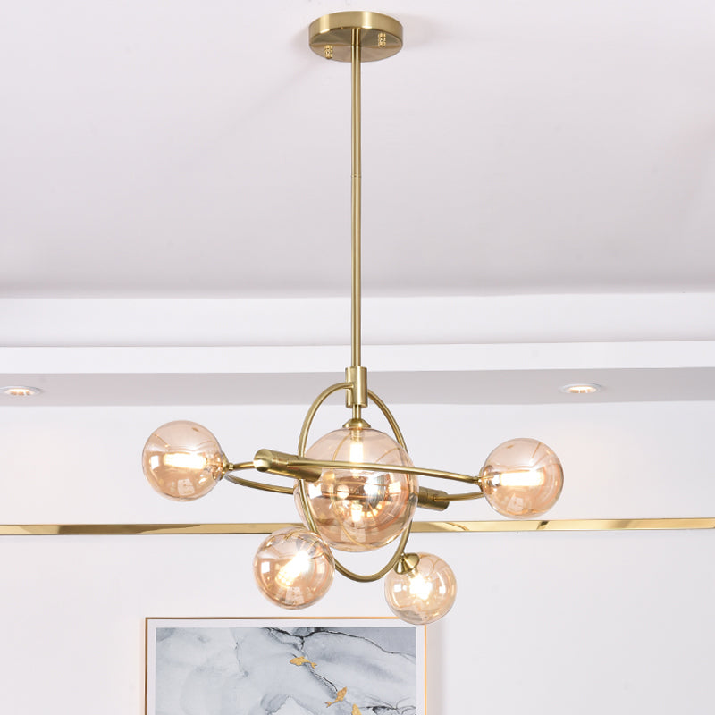 Modernist Sphere Chandelier Lighting Amber Glass 6 Heads Dining Room Ceiling Suspension Lamp Clearhalo 'Ceiling Lights' 'Chandeliers' 'Glass shade' 'Glass' 'Modern Chandeliers' 'Modern' Lighting' 324405