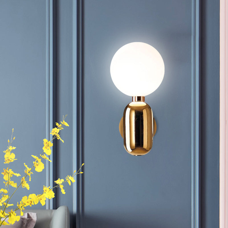 Globe Sconce Light Modernism White Glass 6"/8" Wide 1 Bulb Gold Wall Mounted Lighting Clearhalo 'Cast Iron' 'Glass' 'Industrial' 'Modern wall lights' 'Modern' 'Tiffany' 'Traditional wall lights' 'Wall Lamps & Sconces' 'Wall Lights' Lighting' 325072