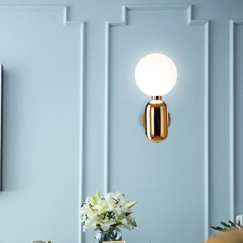 Globe Sconce Light Modernism White Glass 6"/8" Wide 1 Bulb Gold Wall Mounted Lighting Clearhalo 'Cast Iron' 'Glass' 'Industrial' 'Modern wall lights' 'Modern' 'Tiffany' 'Traditional wall lights' 'Wall Lamps & Sconces' 'Wall Lights' Lighting' 325073