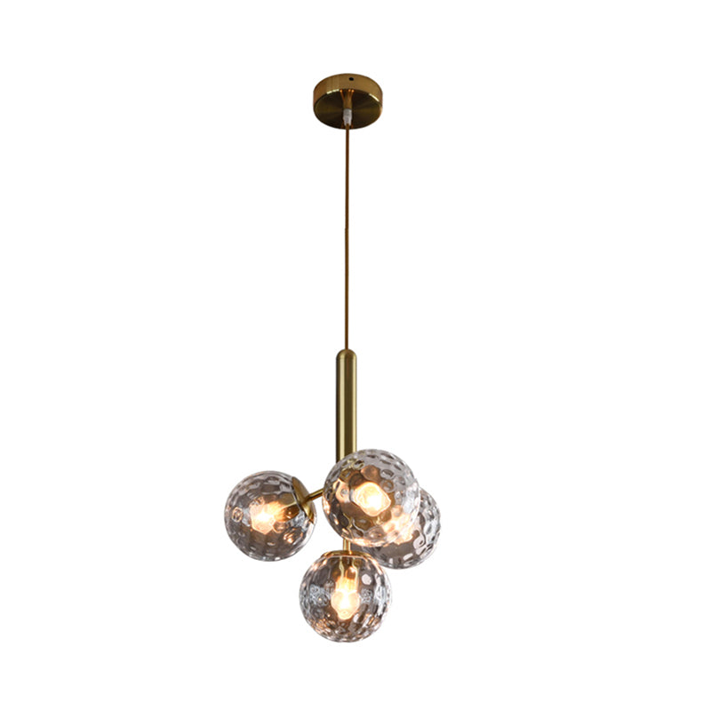 4 Heads Globe Ceiling Chandelier Modernism Dimpled Blown Glass Hanging Light Fixture in Gold Clearhalo 'Ceiling Lights' 'Chandeliers' 'Close To Ceiling Lights' 'Glass shade' 'Glass' 'Modern Chandeliers' 'Modern' Lighting' 325246