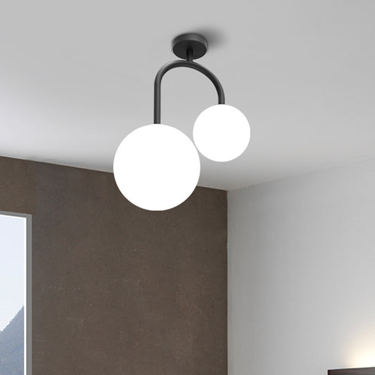 2 Heads Spherical Semi Flush Mount Modernist Milk Glass Ceiling Light Fixture in Black Black Clearhalo 'Ceiling Lights' 'Close To Ceiling Lights' 'Close to ceiling' Lighting' 325484