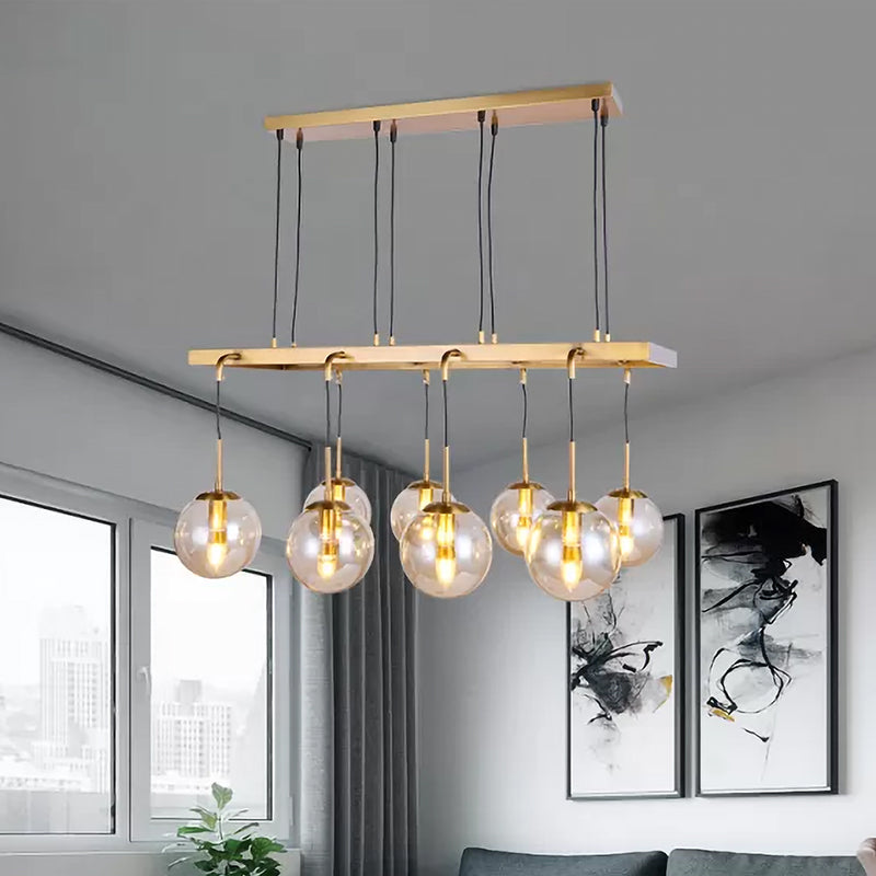 Modern 8 Heads Island Lamp Brass Ball Hanging Pendant Light with Clear Glass Shade Brass Clearhalo 'Ceiling Lights' 'Close To Ceiling Lights' 'Glass shade' 'Glass' 'Island Lights' Lighting' 325551