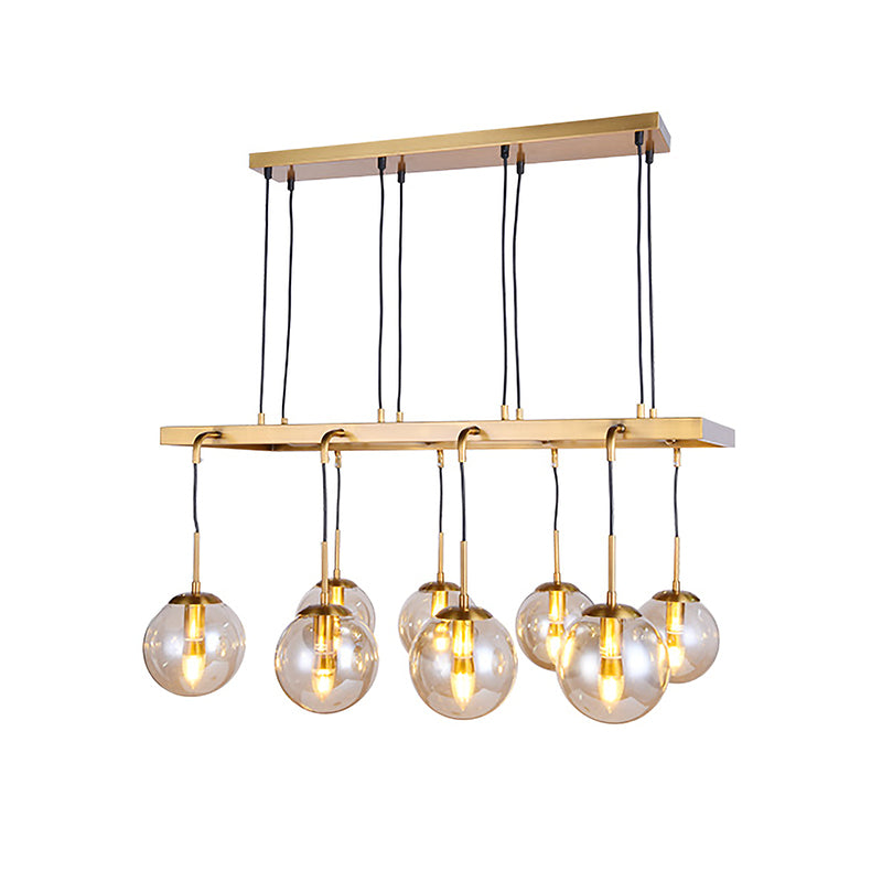 Modern 8 Heads Island Lamp Brass Ball Hanging Pendant Light with Clear Glass Shade Clearhalo 'Ceiling Lights' 'Close To Ceiling Lights' 'Glass shade' 'Glass' 'Island Lights' Lighting' 325554