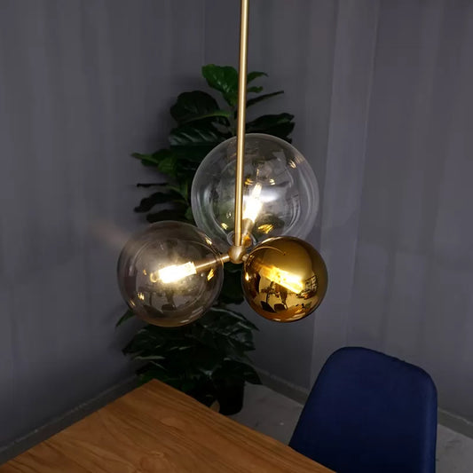 Clear Glass Sphere Hanging Chandelier Modernist 3 Heads Gold Ceiling Pendant Light Gold Clearhalo 'Ceiling Lights' 'Chandeliers' 'Close To Ceiling Lights' 'Glass shade' 'Glass' 'Modern Chandeliers' 'Modern' Lighting' 325556
