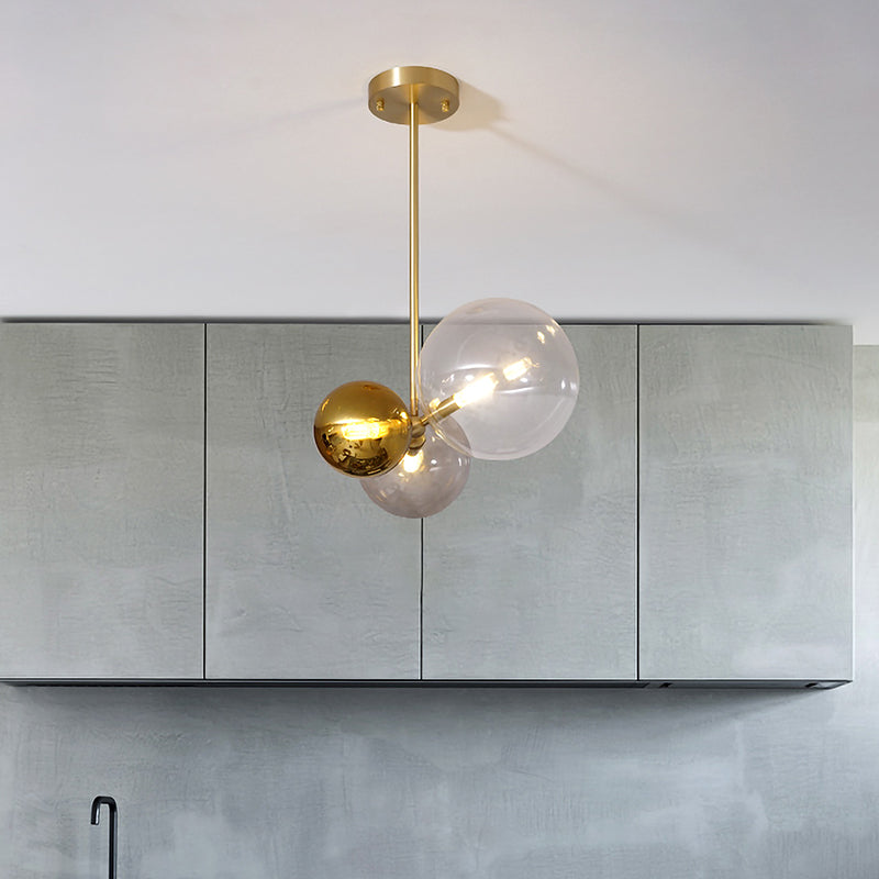 Clear Glass Sphere Hanging Chandelier Modernist 3 Heads Gold Ceiling Pendant Light Clearhalo 'Ceiling Lights' 'Chandeliers' 'Close To Ceiling Lights' 'Glass shade' 'Glass' 'Modern Chandeliers' 'Modern' Lighting' 325558