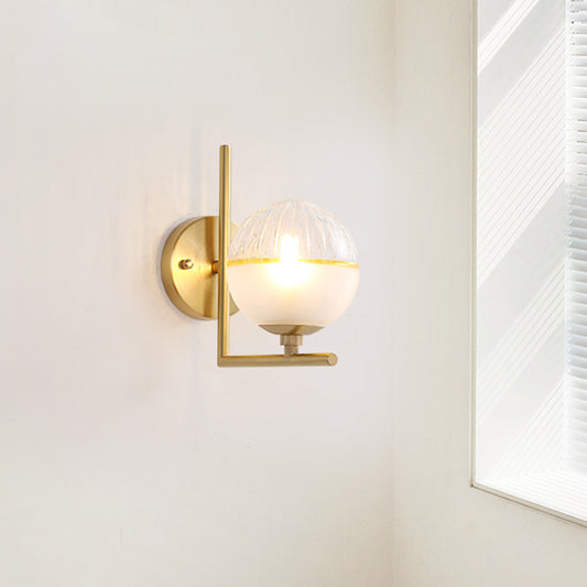Frosted Glass Global Sconce Modernist 1 Head Brass Wall Mounted Light Fixture with Metal Arm Brass Clearhalo 'Cast Iron' 'Glass' 'Industrial' 'Modern wall lights' 'Modern' 'Tiffany' 'Traditional wall lights' 'Wall Lamps & Sconces' 'Wall Lights' Lighting' 325811