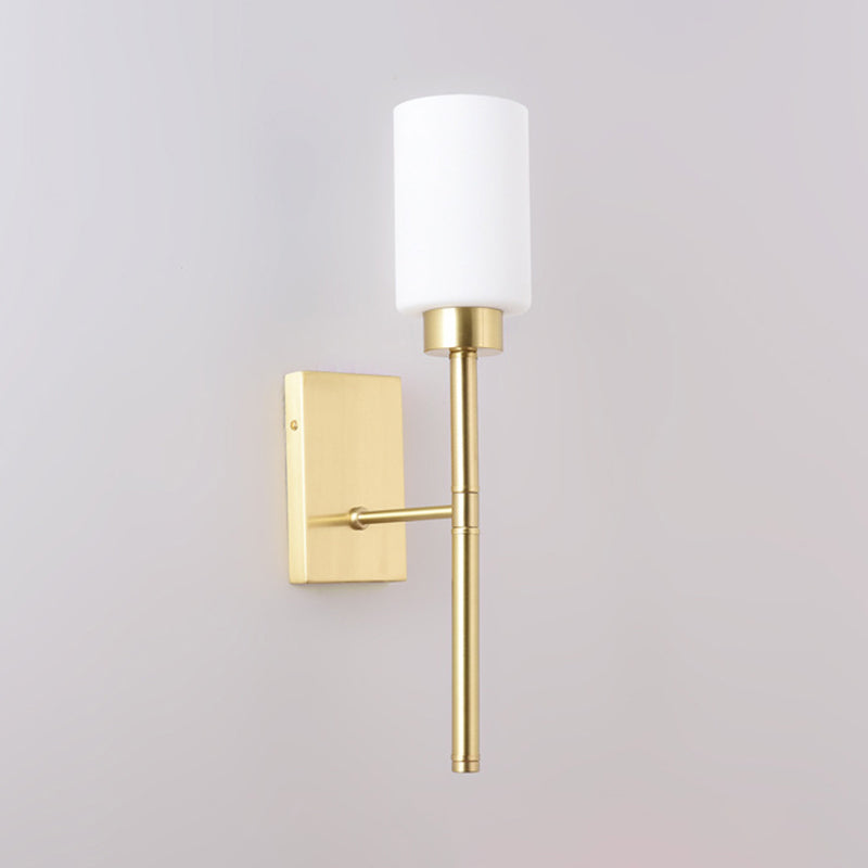 Opal Glass Tube Sconce Modernist 1 Bulb Wall Lighting Fixture in Brass with Metal Pencil Arm Clearhalo 'Cast Iron' 'Glass' 'Industrial' 'Modern wall lights' 'Modern' 'Tiffany' 'Traditional wall lights' 'Wall Lamps & Sconces' 'Wall Lights' Lighting' 330829