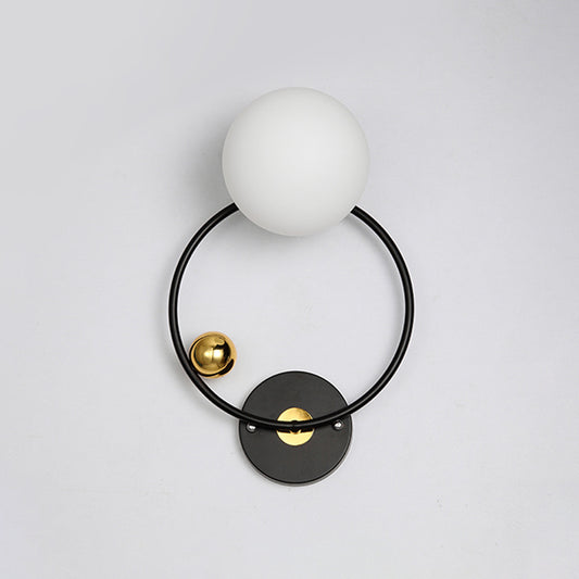 Black Circular Wall Lighting Modernist 1 Head Metal Sconce Light Fixture with Opal Glass Shade Black Clearhalo 'Cast Iron' 'Glass' 'Industrial' 'Modern wall lights' 'Modern' 'Tiffany' 'Traditional wall lights' 'Wall Lamps & Sconces' 'Wall Lights' Lighting' 330837