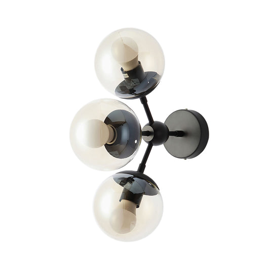 3 Bulbs Spherical Vanity Light Modern Clear Glass Wall Mounted Lighting in Black for Bathroom Clearhalo 'Cast Iron' 'Glass' 'Industrial' 'Modern wall lights' 'Modern' 'Tiffany' 'Traditional wall lights' 'Wall Lamps & Sconces' 'Wall Lights' Lighting' 330882