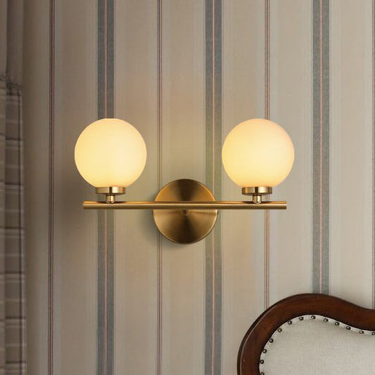 2 Bulbs Bedside Wall Lamp Modern Gold Sconce Light Fixture with Ball Milky Glass Shade Gold Clearhalo 'Cast Iron' 'Glass' 'Industrial' 'Modern wall lights' 'Modern' 'Tiffany' 'Traditional wall lights' 'Wall Lamps & Sconces' 'Wall Lights' Lighting' 331309