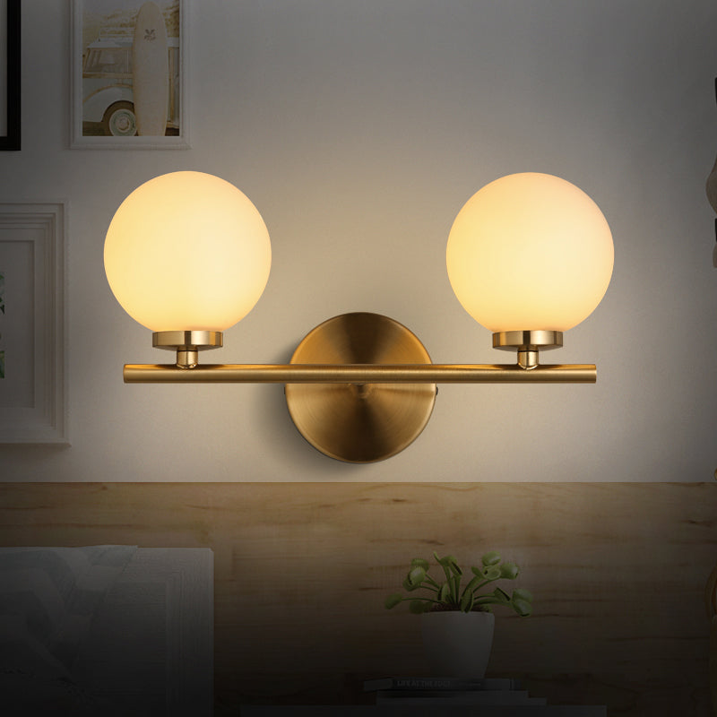 2 Bulbs Bedside Wall Lamp Modern Gold Sconce Light Fixture with Ball Milky Glass Shade Clearhalo 'Cast Iron' 'Glass' 'Industrial' 'Modern wall lights' 'Modern' 'Tiffany' 'Traditional wall lights' 'Wall Lamps & Sconces' 'Wall Lights' Lighting' 331310