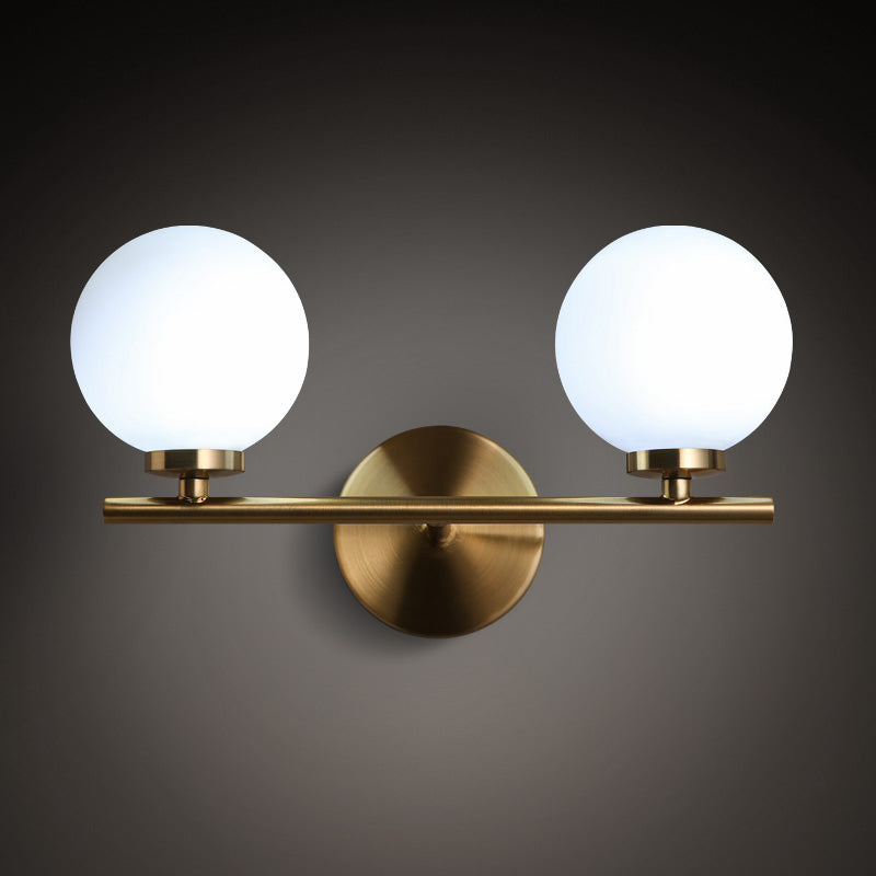 2 Bulbs Bedside Wall Lamp Modern Gold Sconce Light Fixture with Ball Milky Glass Shade Clearhalo 'Cast Iron' 'Glass' 'Industrial' 'Modern wall lights' 'Modern' 'Tiffany' 'Traditional wall lights' 'Wall Lamps & Sconces' 'Wall Lights' Lighting' 331311