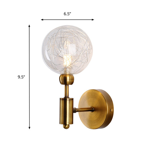1/2-Light Bedroom Sconce Wall Light Industrial Style Black/Brass Finish Wall Lamp with Orbit Clear Glass Shade Clearhalo 'Art deco wall lights' 'Cast Iron' 'Glass' 'Industrial wall lights' 'Industrial' 'Middle century wall lights' 'Modern' 'Rustic wall lights' 'Tiffany' 'Traditional wall lights' 'Wall Lamps & Sconces' 'Wall Lights' Lighting' 331679