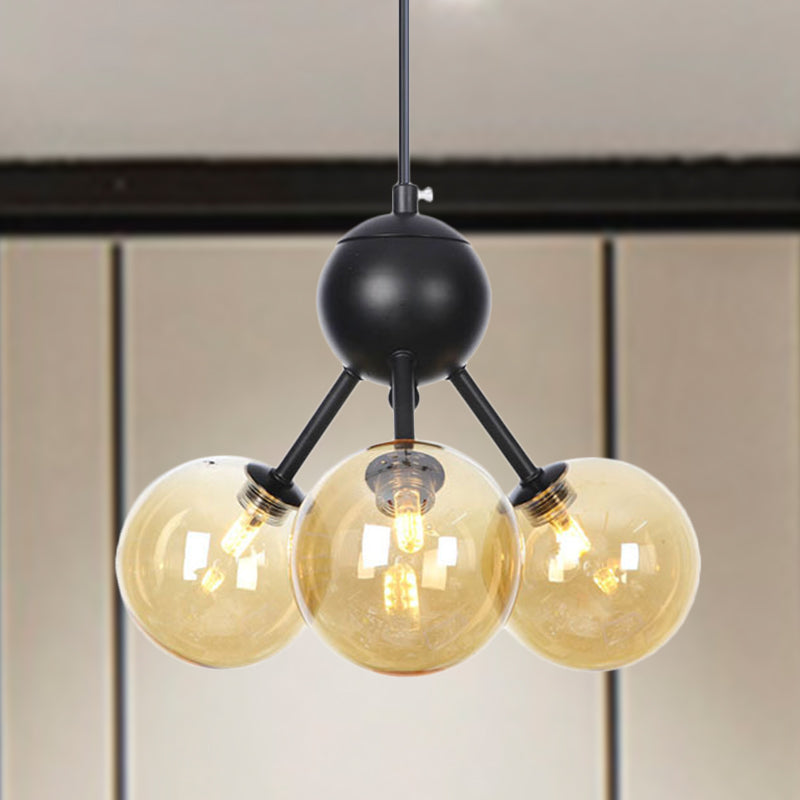 Amber Glass Globe Ceiling Chandelier Modernist 3 Heads LED Hanging Pendant Lamp in Black Amber Clearhalo 'Ceiling Lights' 'Chandeliers' 'Glass shade' 'Glass' 'Modern Chandeliers' 'Modern' 'Pendant Lights' Lighting' 331844