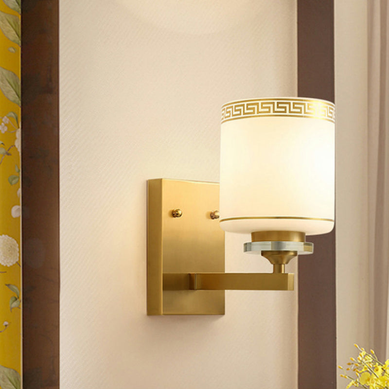 Single Cylinder Wall Light Sconce Traditional Opal Frosted Glass Wall Lamp in Gold with Swastika Element Clearhalo 'Wall Lamps & Sconces' 'Wall Lights' Lighting' 333689