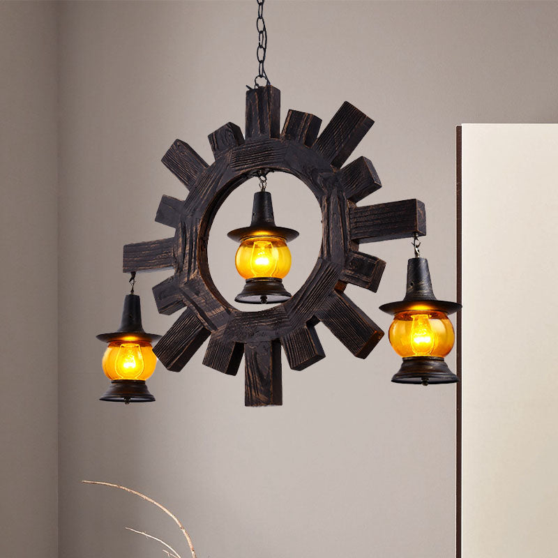 Amber Glass Black Chandelier Light Kerosene 3 Lights Factory Ceiling Hang Fixture for Living Room Black Clearhalo 'Ceiling Lights' 'Chandeliers' 'Glass shade' 'Glass' 'Industrial Chandeliers' 'Industrial' 'Middle Century Chandeliers' 'Tiffany' Lighting' 337409