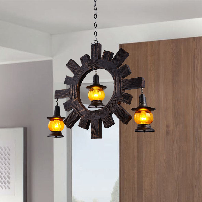 Amber Glass Black Chandelier Light Kerosene 3 Lights Factory Ceiling Hang Fixture for Living Room Clearhalo 'Ceiling Lights' 'Chandeliers' 'Glass shade' 'Glass' 'Industrial Chandeliers' 'Industrial' 'Middle Century Chandeliers' 'Tiffany' Lighting' 337411