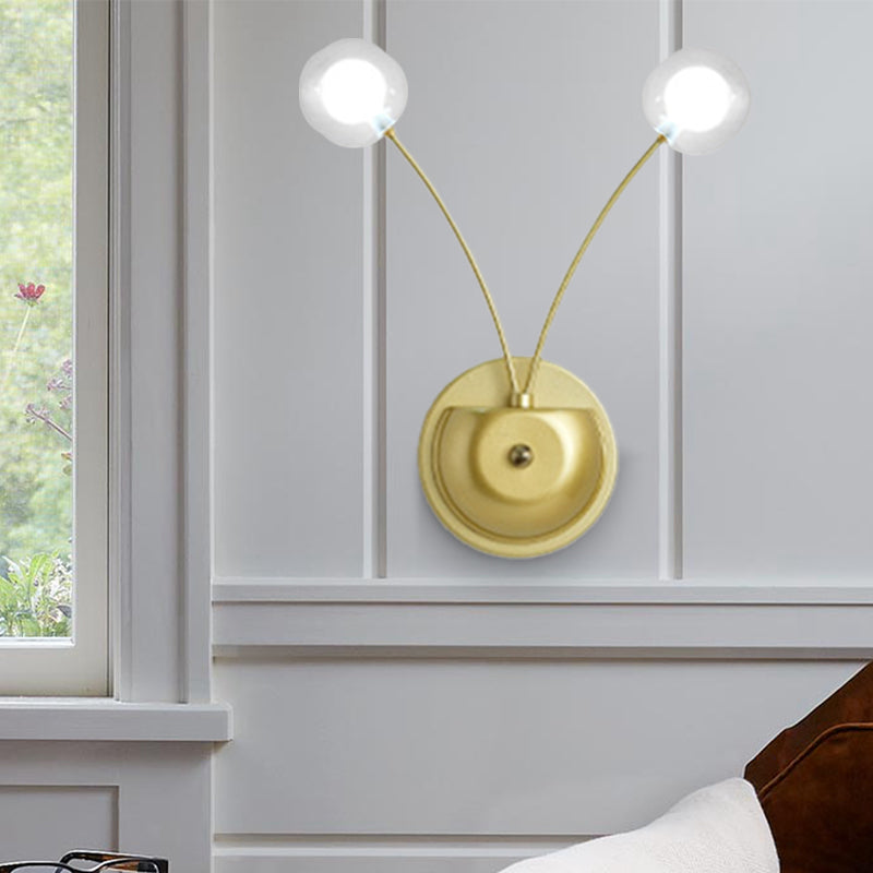 2 Bulbs Bedroom Wall Light Contemporary Gold LED Wall Mounted Lighting with Global Clear Glass Shade Clearhalo 'Cast Iron' 'Glass' 'Industrial' 'Modern wall lights' 'Modern' 'Tiffany' 'Traditional wall lights' 'Wall Lamps & Sconces' 'Wall Lights' Lighting' 339156