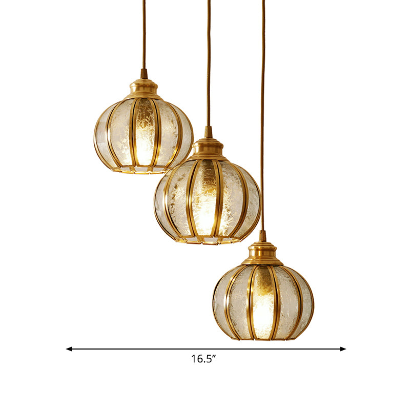 Textured Glass Sphere Cluster Pendant Light Retro 1/3 Bulbs Brass Hanging Lamp with Round/Linear Canopy Clearhalo 'Ceiling Lights' 'Glass shade' 'Glass' 'Pendant Lights' 'Pendants' Lighting' 342716