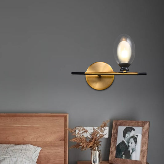 Vintage Oval Wall Sconce 1 Light Clear Glass Bedroom Wall Mounted Lamp with Brass Bar Clear Clearhalo 'Cast Iron' 'Glass' 'Industrial' 'Modern wall lights' 'Modern' 'Tiffany' 'Traditional wall lights' 'Vanity Lights' 'Wall Lights' Lighting' 370363